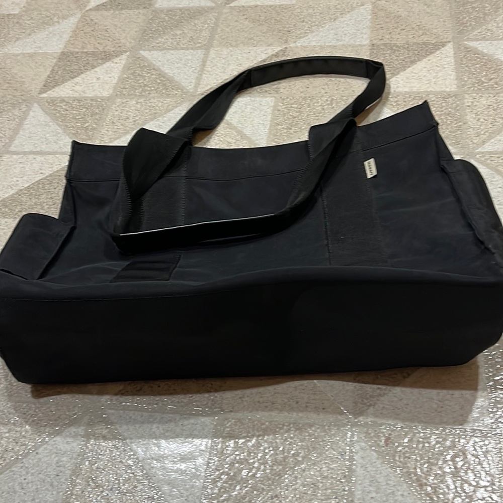 Old Navy Black nylon tote bag. Great pockets and compartments. Sturdy Strap - Picture 12 of 12